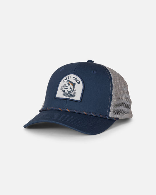 The Fishing Club Trucker - Navy/Grey by Salty Crew is a low crown mesh trucker hat featuring a curved brim and a front patch with a jumping fish and the words “Salty Crew.”.