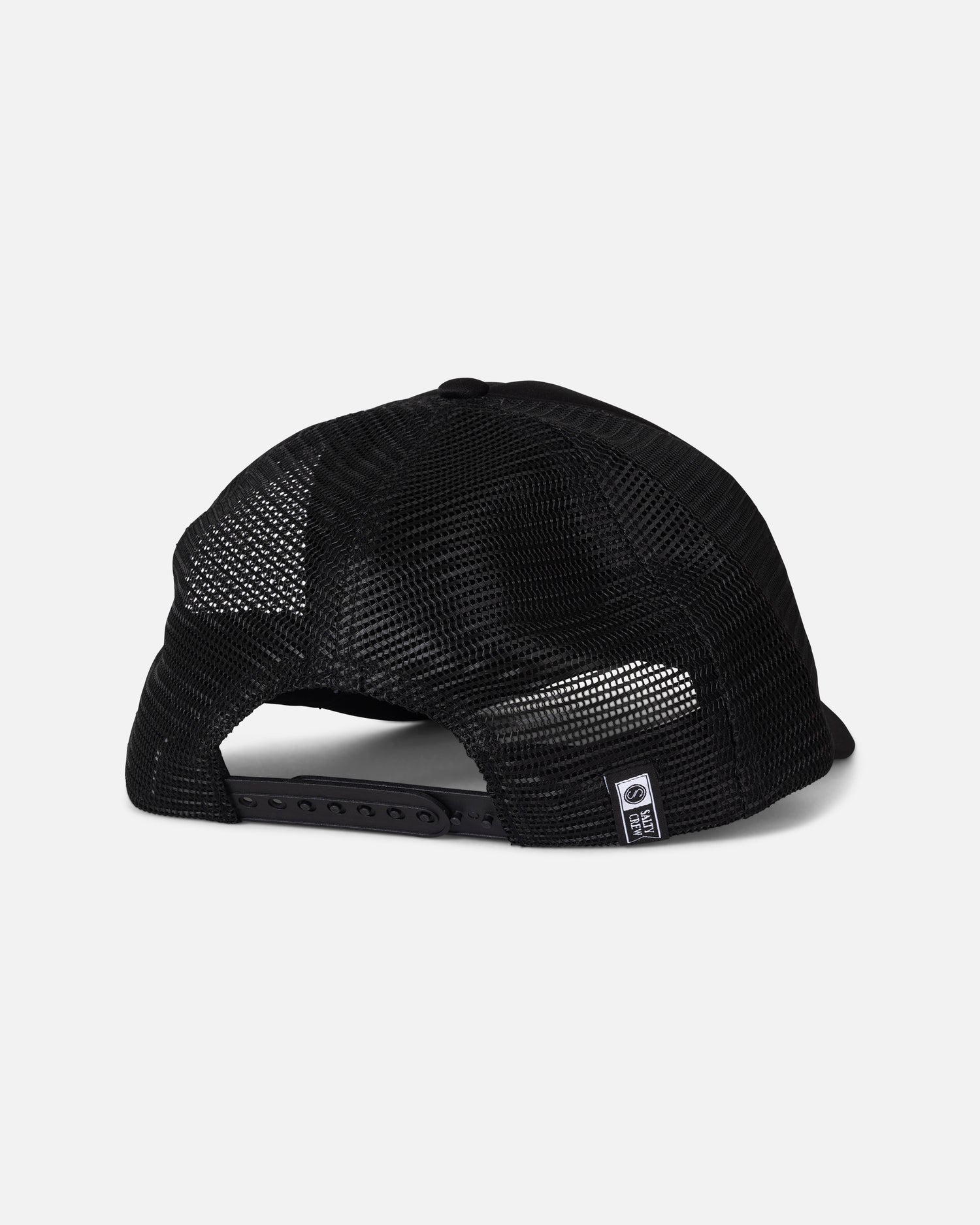 A rear view of the Salty Crew Seaside Trucker - Black hat highlights its breathable mesh back, adjustable snapback closure, and a subtle Salty Crew brand label on the back panel, all set against a plain light grey background.