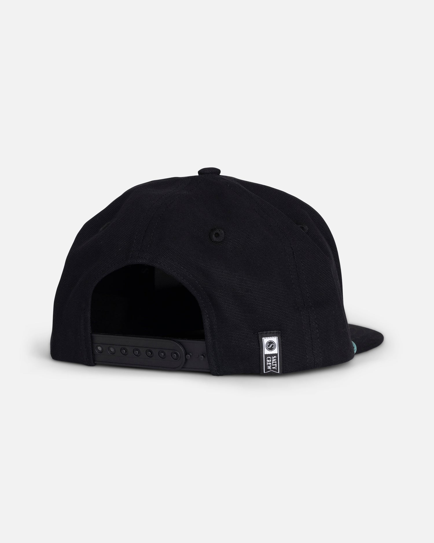 The Salty Crew Hooked Up Boys Snapback in black is displayed from the back, highlighting its adjustable strap and a small rectangular Salty Crew logo label positioned near the opening. Crafted from cotton for comfort, this 5-panel snapback cap features subtle embroidered details for added style.