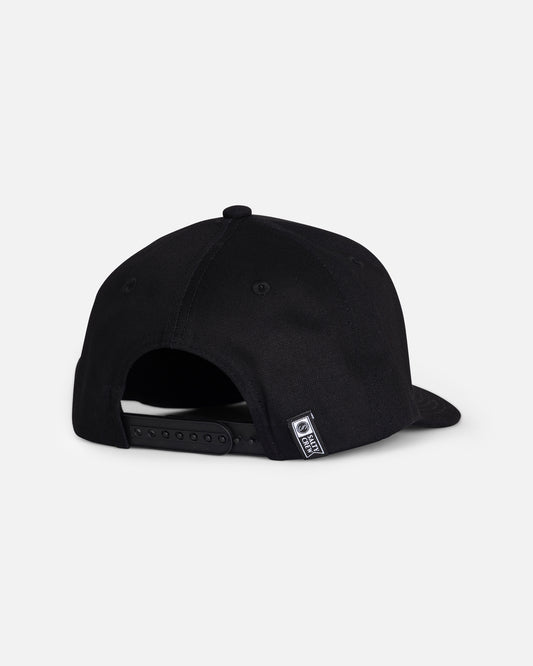The Salty Crew Tailfin Boys Snapback - Black is displayed from the back, highlighting its adjustable strap and a small rectangular logo tag on the lower edge. This sleek 5-panel cotton baseball cap stands out against the plain, light-colored background.