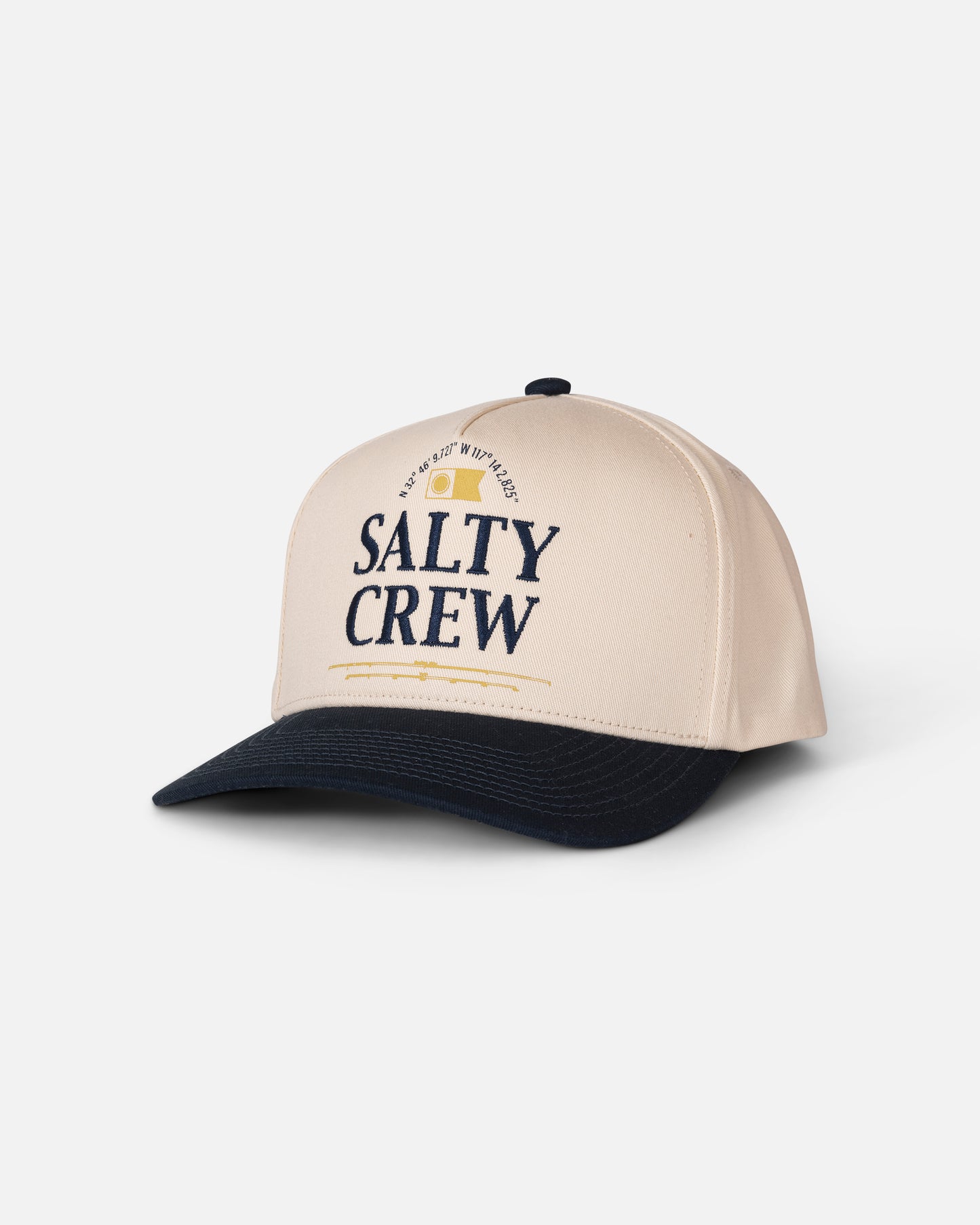 The Salty Crew Coordinates Snapback in Off White/Navy features a classic 5 panel cotton design with “SALTY CREW” boldly printed on the front and a small wave graphic above the text, delivering timeless style and comfort for any adventure.