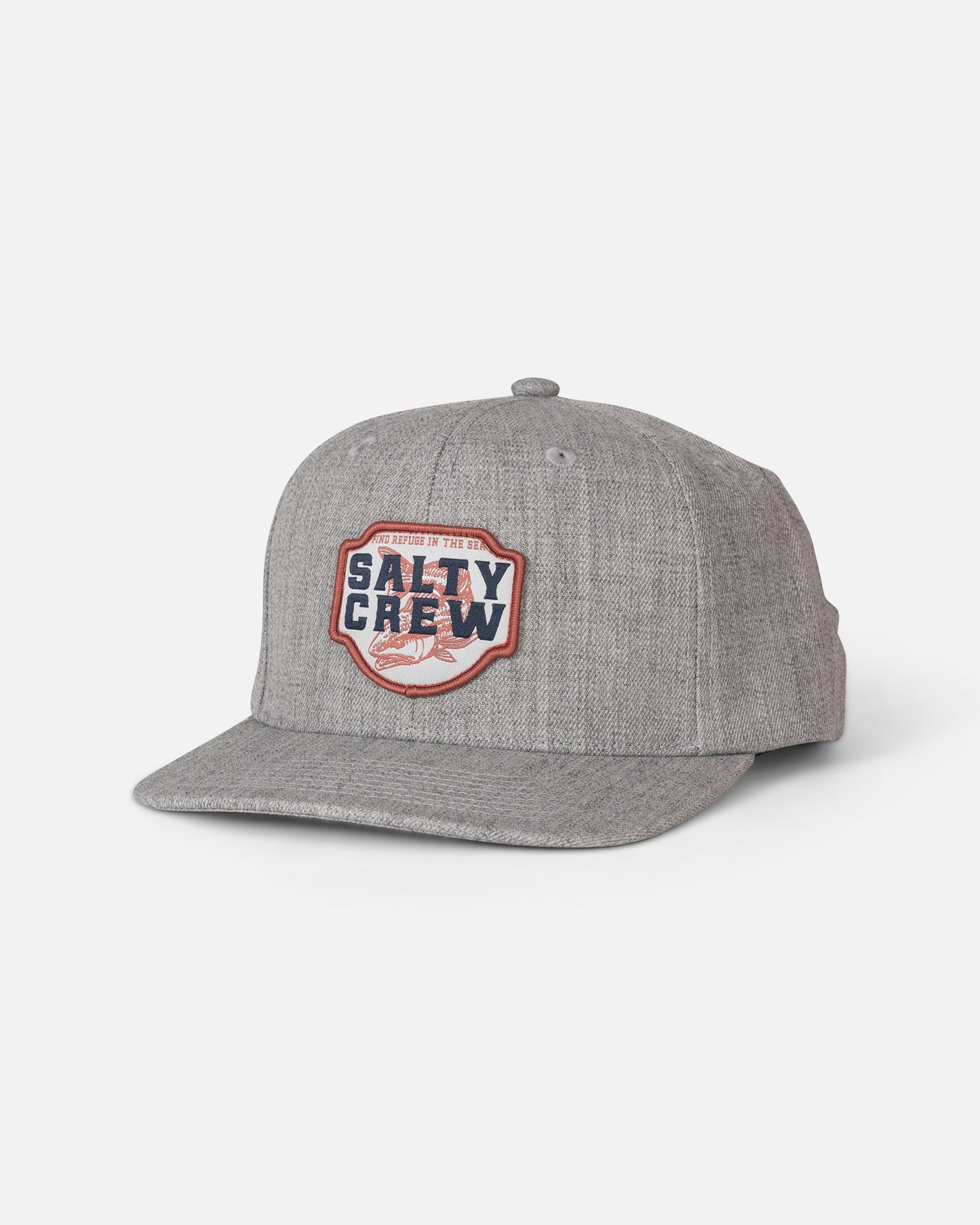 The Salty Crew Red Fish Snapback - Heather Grey is a gray acrylic wool snapback hat with a flat brim, featuring a structured 6-panel design and a Salty Crew woven patch with a wave graphic and red and blue accents on the front. The hat is displayed against a plain white background.