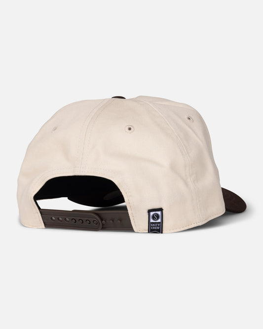 A bone-colored Padres Label Hat by Salty Crew is shown from the back, featuring a brown adjustable strap and a small navy blue woven label near the opening. The background is plain white.