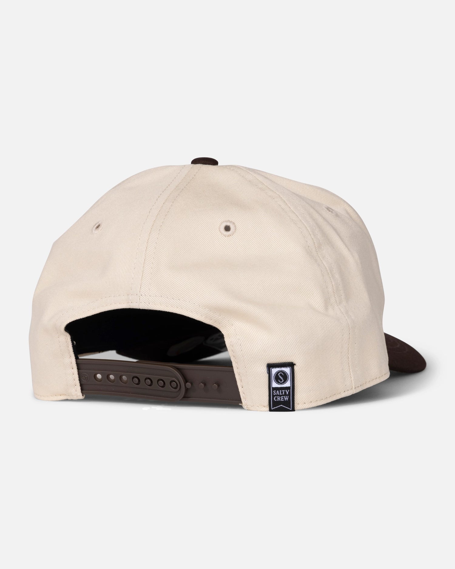 Bone Padres Tippet Hat by Salty Crew, shown from the back with a dark brown snapback closure. This limited edition cap features a small black Salty Crew logo patch near the adjustable strap, delivering understated style inspired by classic ’47 Brand designs.