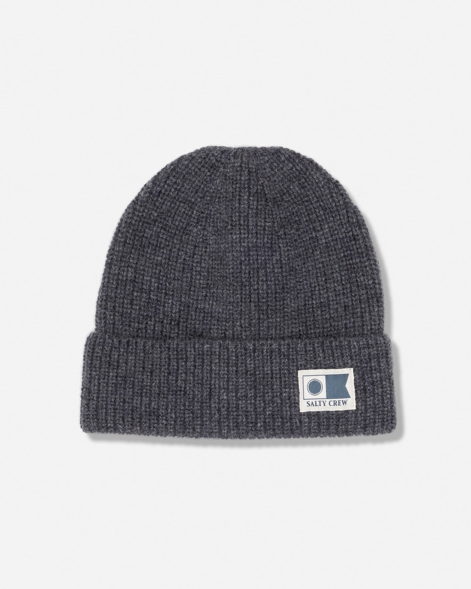 The Refuge Wool Beanie in Dark Grey Heather by Salty Crew is a ribbed knit cuffed beanie with a folded brim, featuring a six-dart construction for superior fit and a white rectangular SALTY CREW patch on the front.