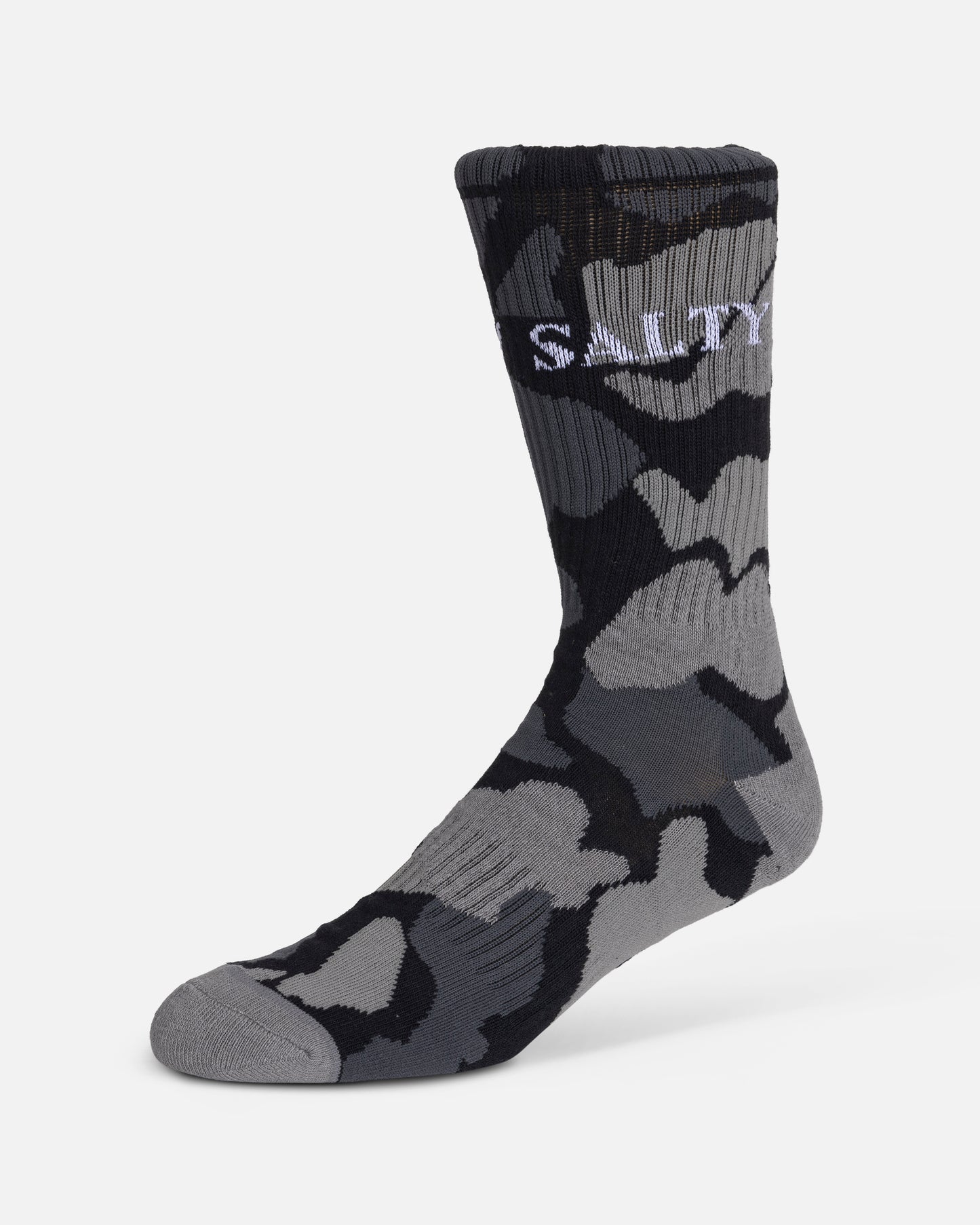 A single Salty Crew sock from the Camo 3-Pack Sock Box (Assorted), size 7-11, shows a black, gray, and dark gray camo pattern with "SALTY" embroidered in white near the top. The cotton blend sock is displayed upright on a plain white background.