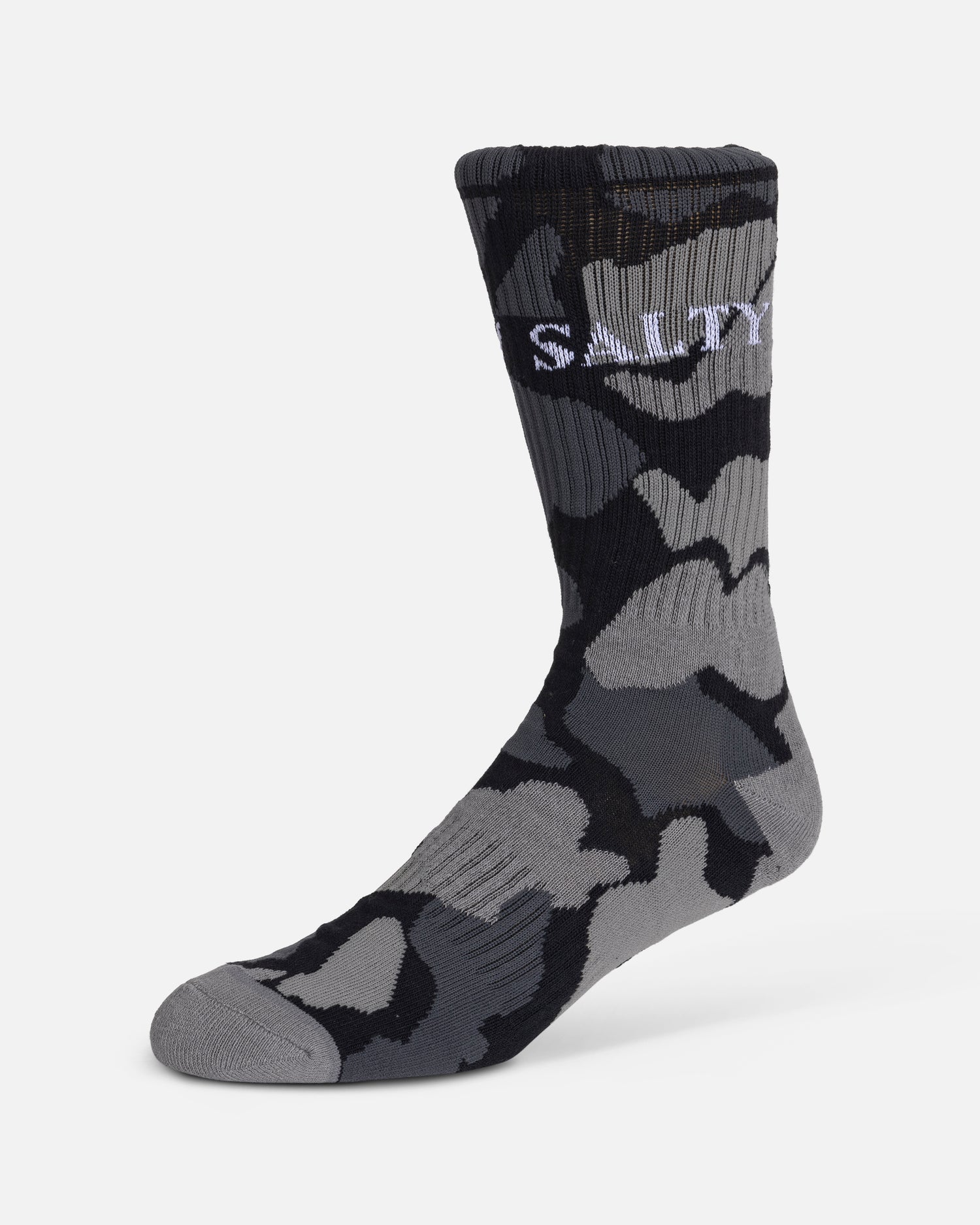 A single Salty Crew sock from the Camo 3-Pack Sock Box (Assorted), size 7-11, shows a black, gray, and dark gray camo pattern with "SALTY" embroidered in white near the top. The cotton blend sock is displayed upright on a plain white background.