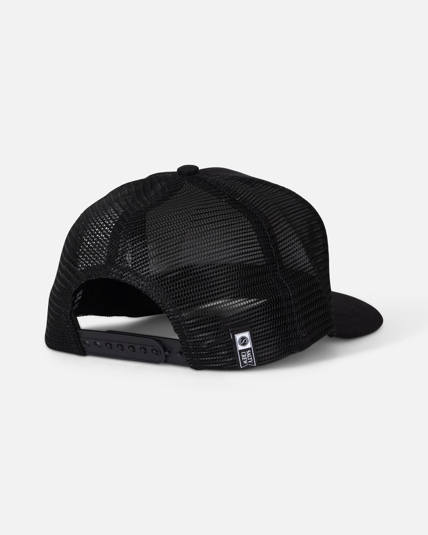 The Salty Crew Coordinates Trucker - Black is a black mesh high crown snapback baseball cap, shown from the back with an adjustable strap and a small rectangular label near the closure. Both the crown and brim are black.