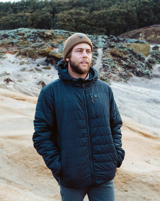 Lifestyle shot of the Barrier Jacket - Black. 