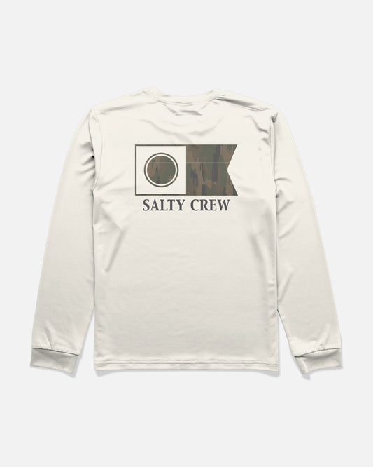 The Salty Crew Flagship Fill Boys Long Sleeve Sunshirt in Bone features a camouflage fish flag graphic and SALTY CREW text printed on the back. Designed for comfort during long days outdoors, it offers UPF 50+ sun protection.