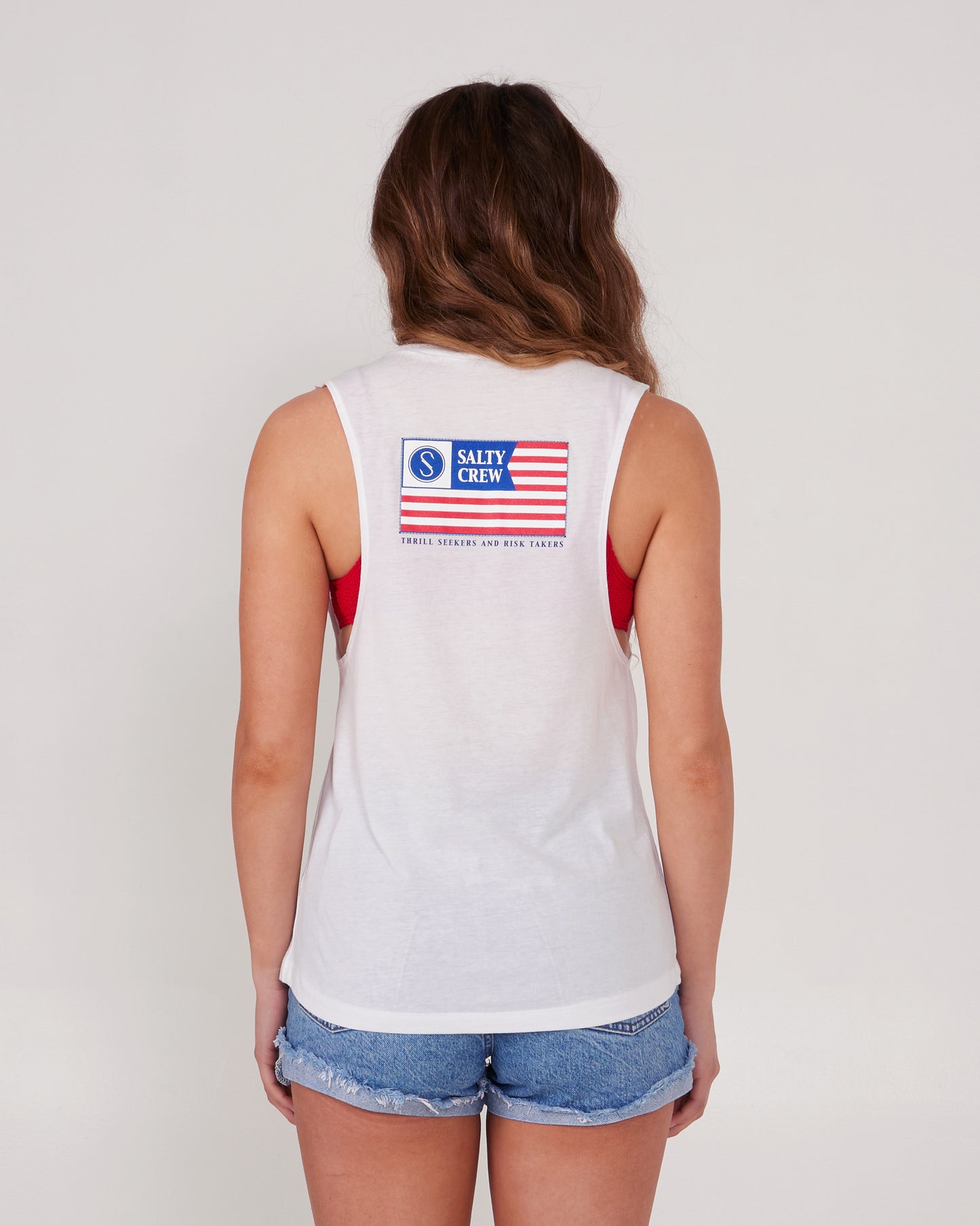 On body back of the FREEDOM FLAG WOMEN MUSCLE TANK