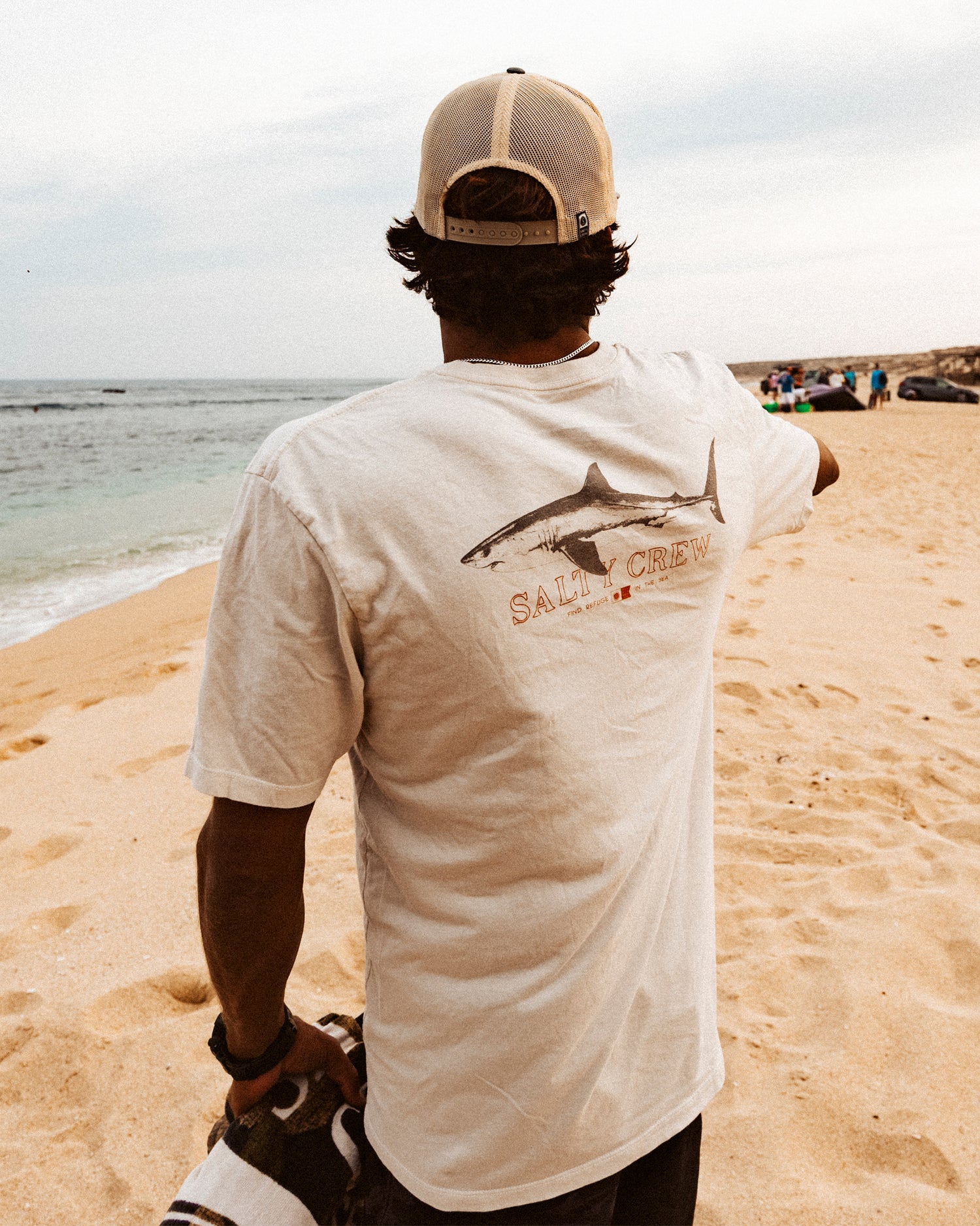 Lifestyle shot of the Brother Bruce Premium Tee - Bone. 
