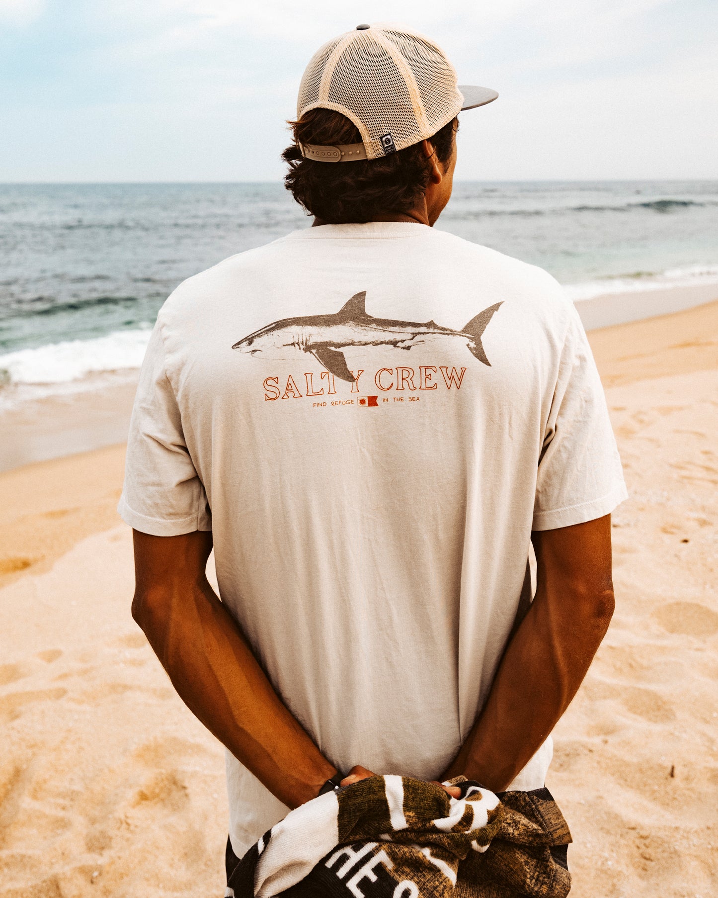 Lifestyle shot of the Brother Bruce Premium Tee - Bone. 