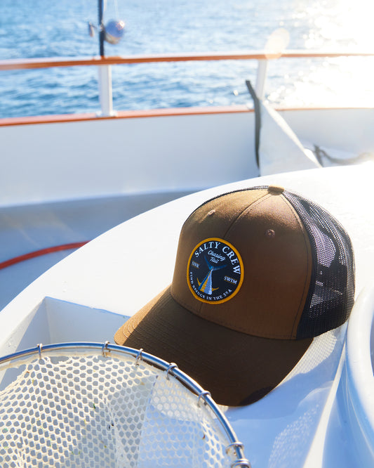 Shot of Salty Crew hat on fishing boat 