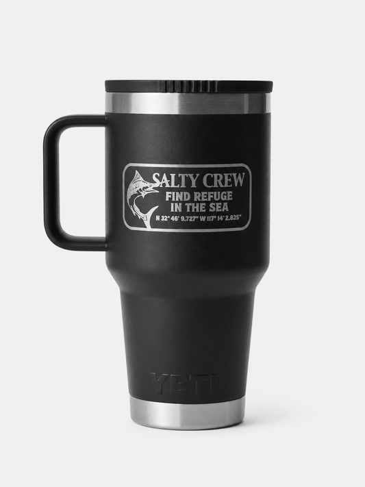 The Salty Crew Yeti x Salty Crew Travel Straw Mug 30 Oz in black is a vacuum-insulated stainless steel mug with handle, featuring a fish graphic, coordinates, and "Find Refuge in the Sea" on a crisp white background.