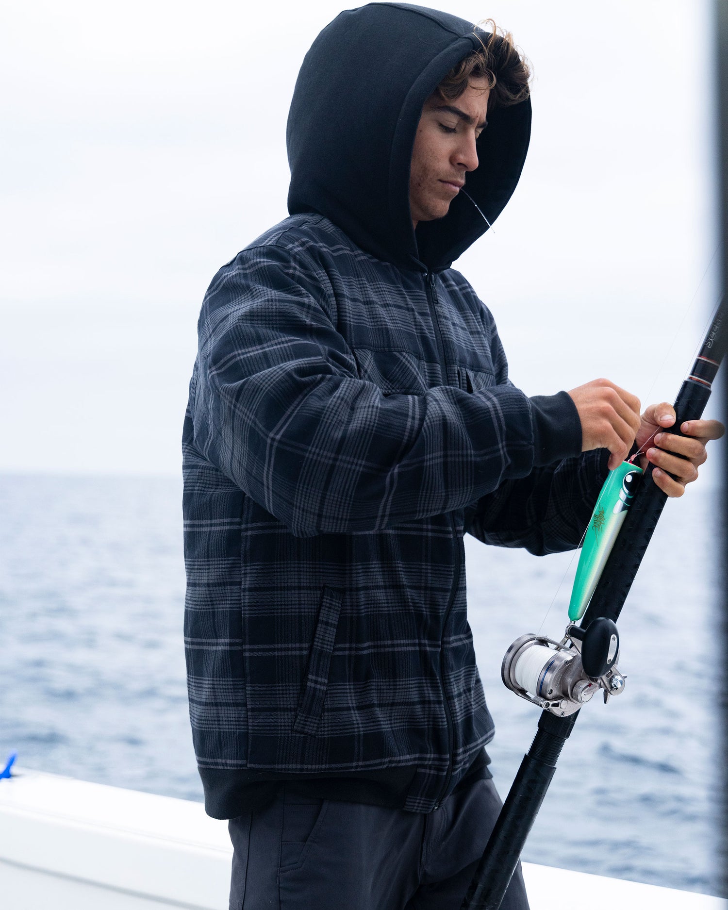 Lifestyle shot of the Fathom Jacket - Black. 