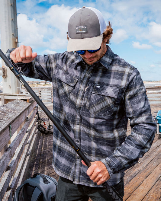 Candid photo of the Fathom Tech Flannel - Pirate Black. 