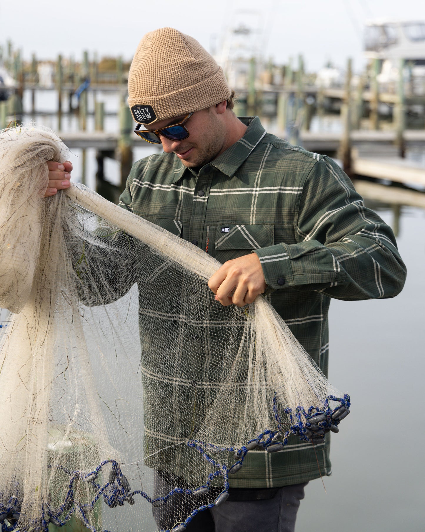 Fishing photo of the Fathom Tech Shacket - Green. 