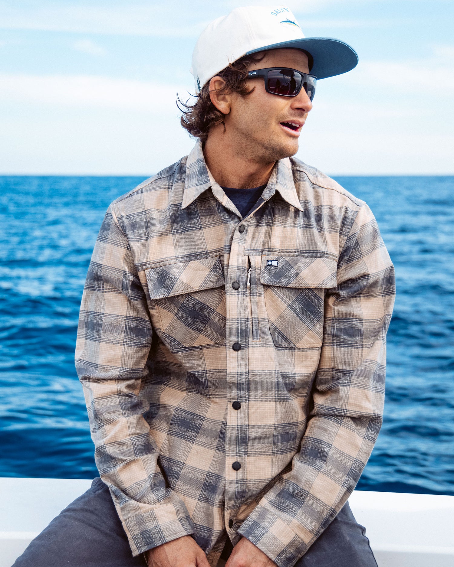 Candid photo of the Fathom Tech Flannel - Khaki. 