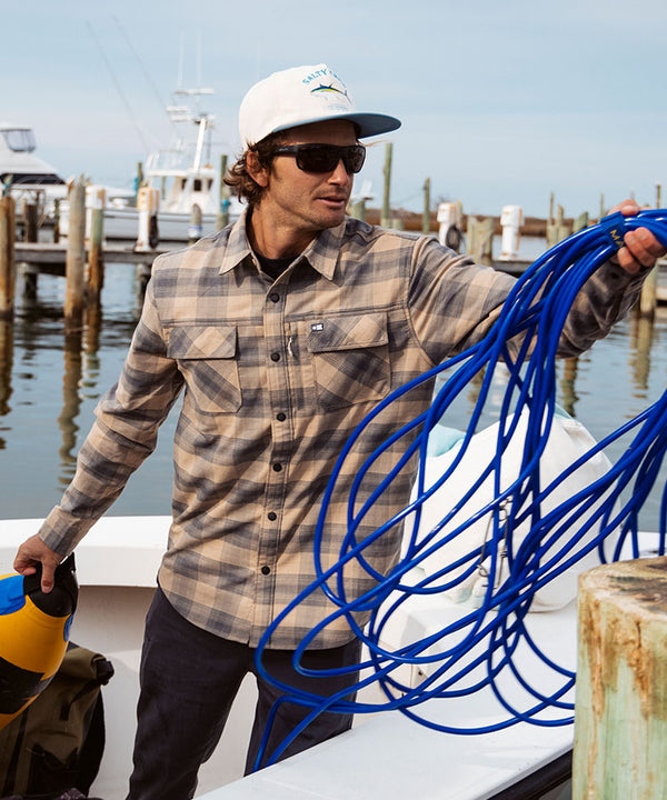 Candid shot of the Fathom Tech Flannel - Khaki. 