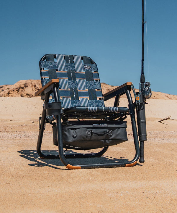 Lifestyle shot of the Parkit x Salty Crew Voyager Chair. 