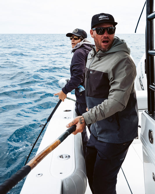 Candid photo of the Long Range Jacket - Iron. 