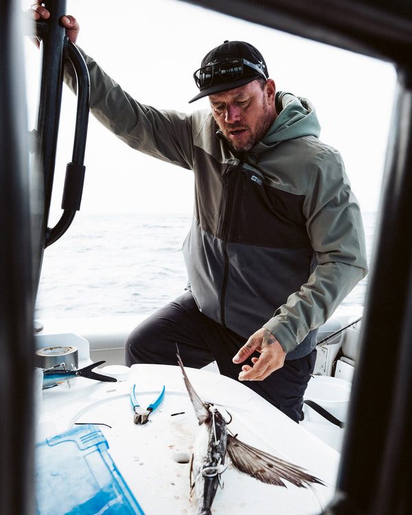 Lifestyle shot of the Long Range Jacket - Iron.