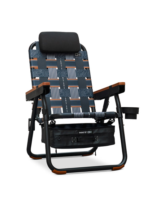The PARKIT Co. Parkit x Salty Crew Eclipse Recliner Chair features a reclining design, patterned fabric, padded headrest, wooden armrests, drink holder, integrated cooler, storage pouch under the seat, and a black frame with stylish brown accents.