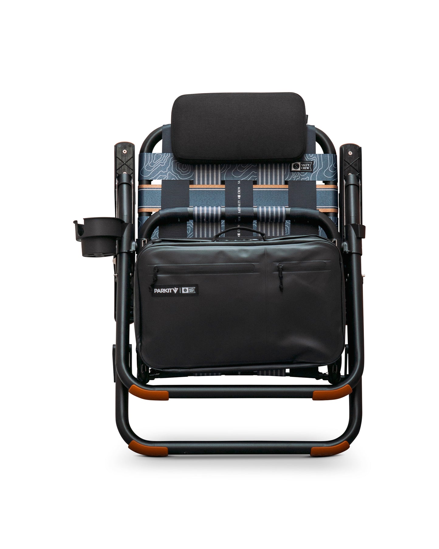 A folded black Parkit x Salty Crew Eclipse Recliner Chair by PARKIT Co. with a headrest, cup holder, front storage bag, patterned fabric, and tan frame accents is shown against a white background.