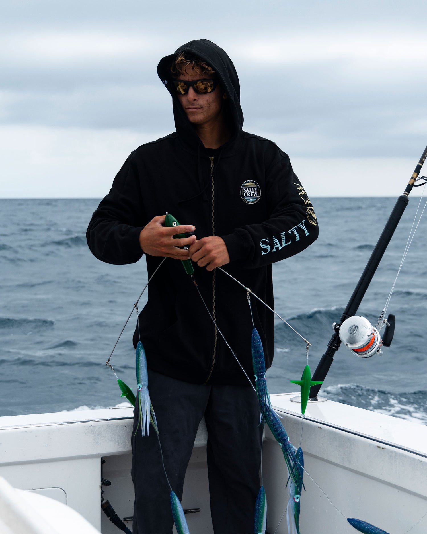 Lifestyle shot of the Simple Fade Zip Fleece Hoodie - Black. 