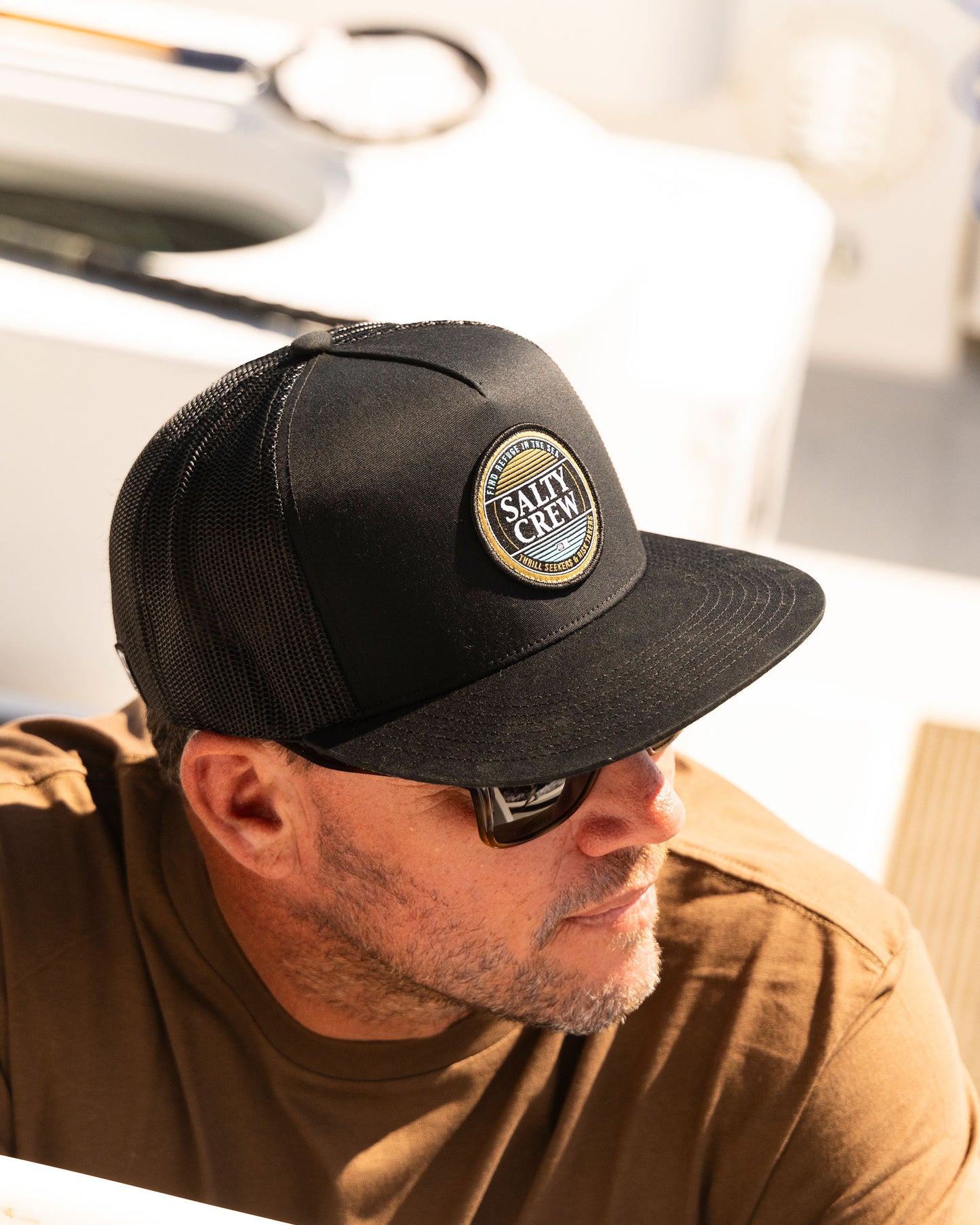 Lifestyle shot of the Simple Fade Trucker - Black. 