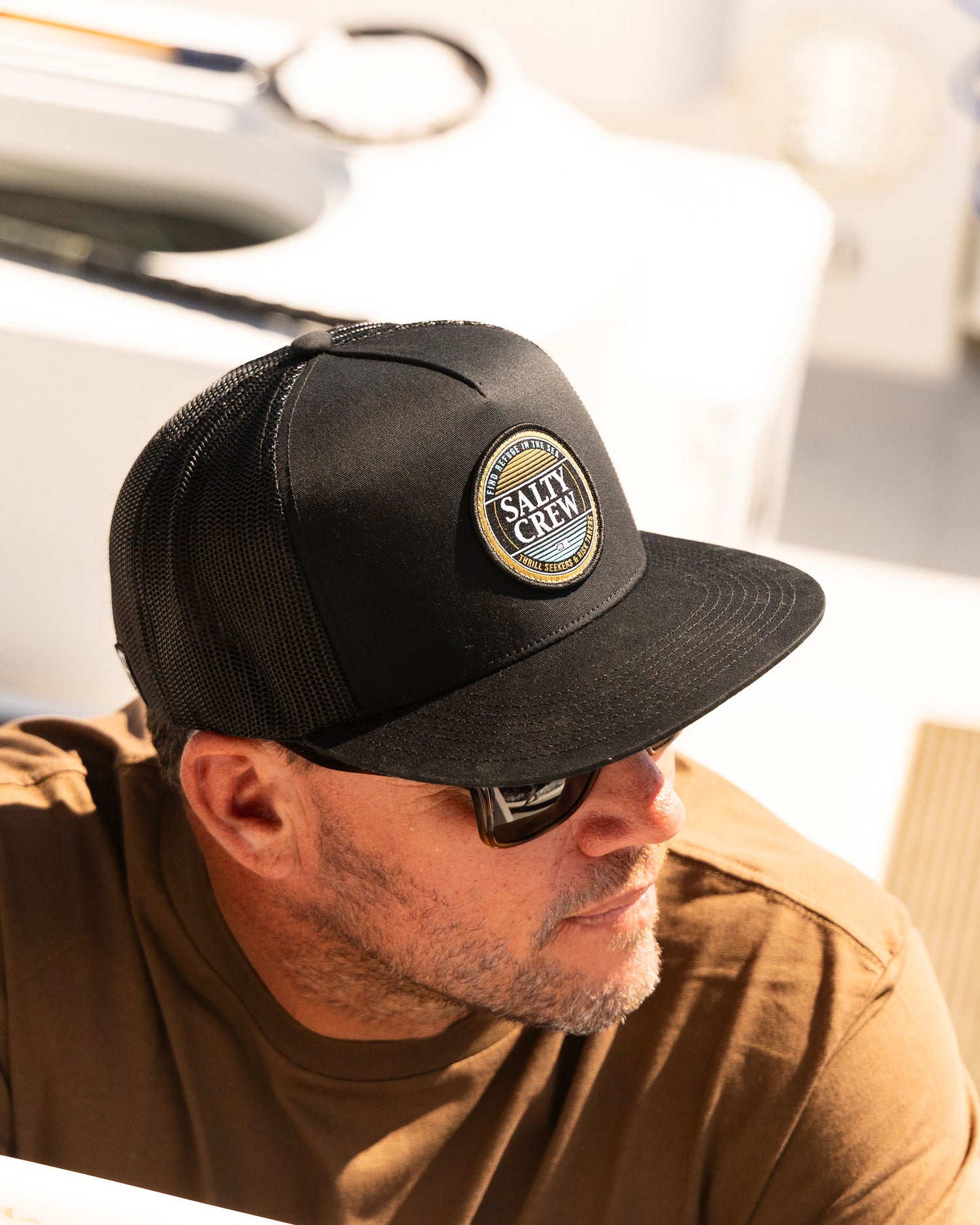 Lifestyle shot of the Simple Fade Trucker - Black. 