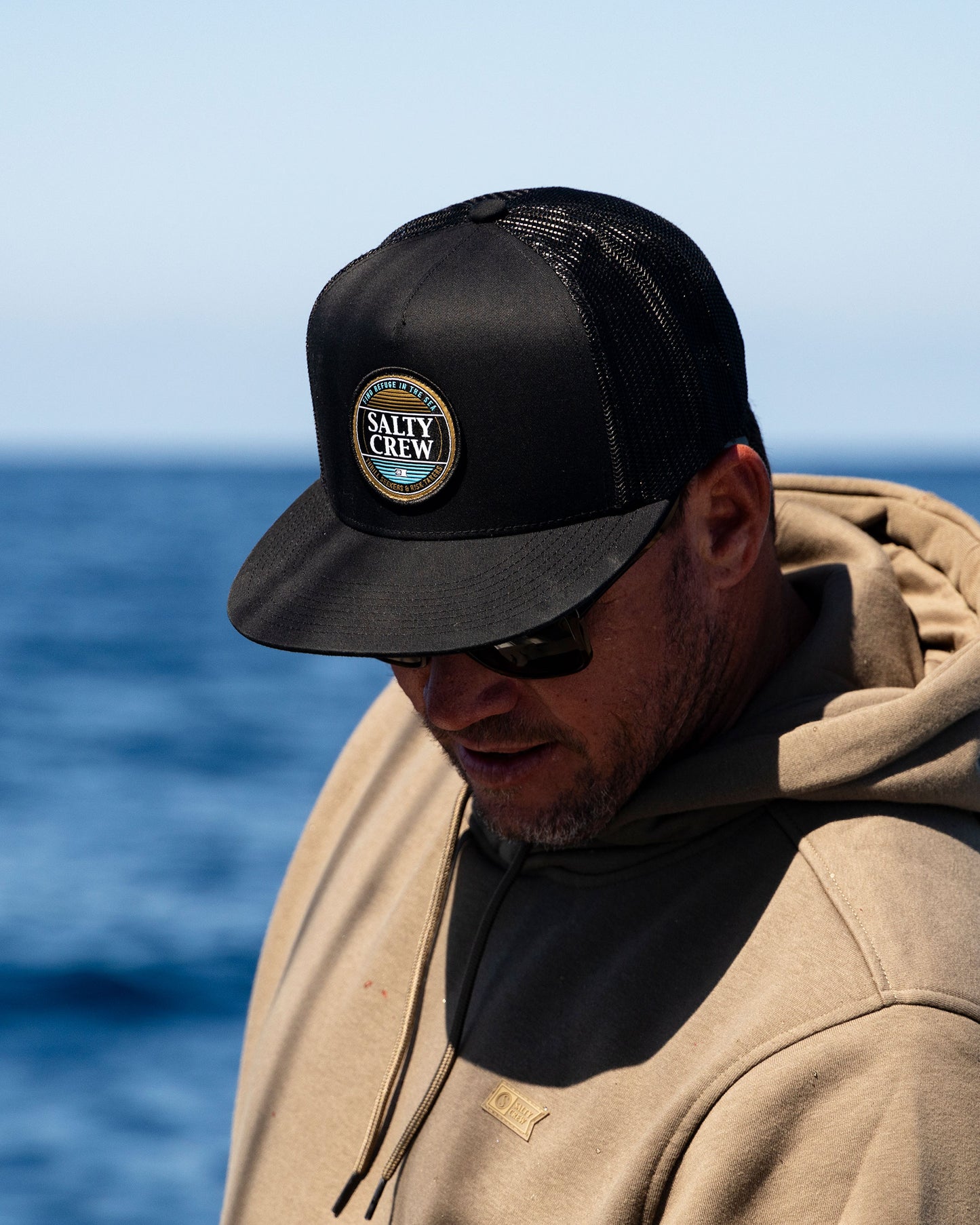 Lifestyle shot of the Simple Fade Trucker - Black. 