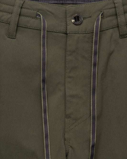 Close up shot of the Transom Tech Short - Dusty Olive. 