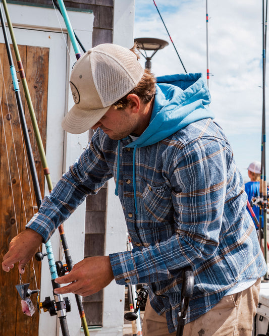 Outdoor shot of the Whitewash Hooded Flannel - Midnight Navy. 