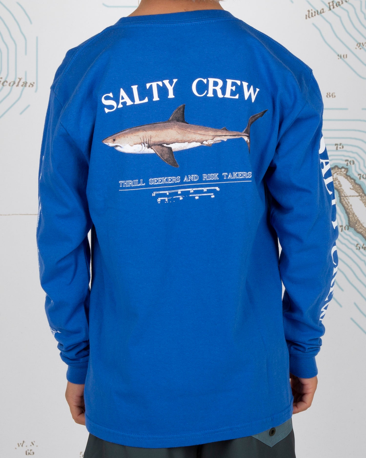 On body back of Bruce Boys Royal L/S Tee