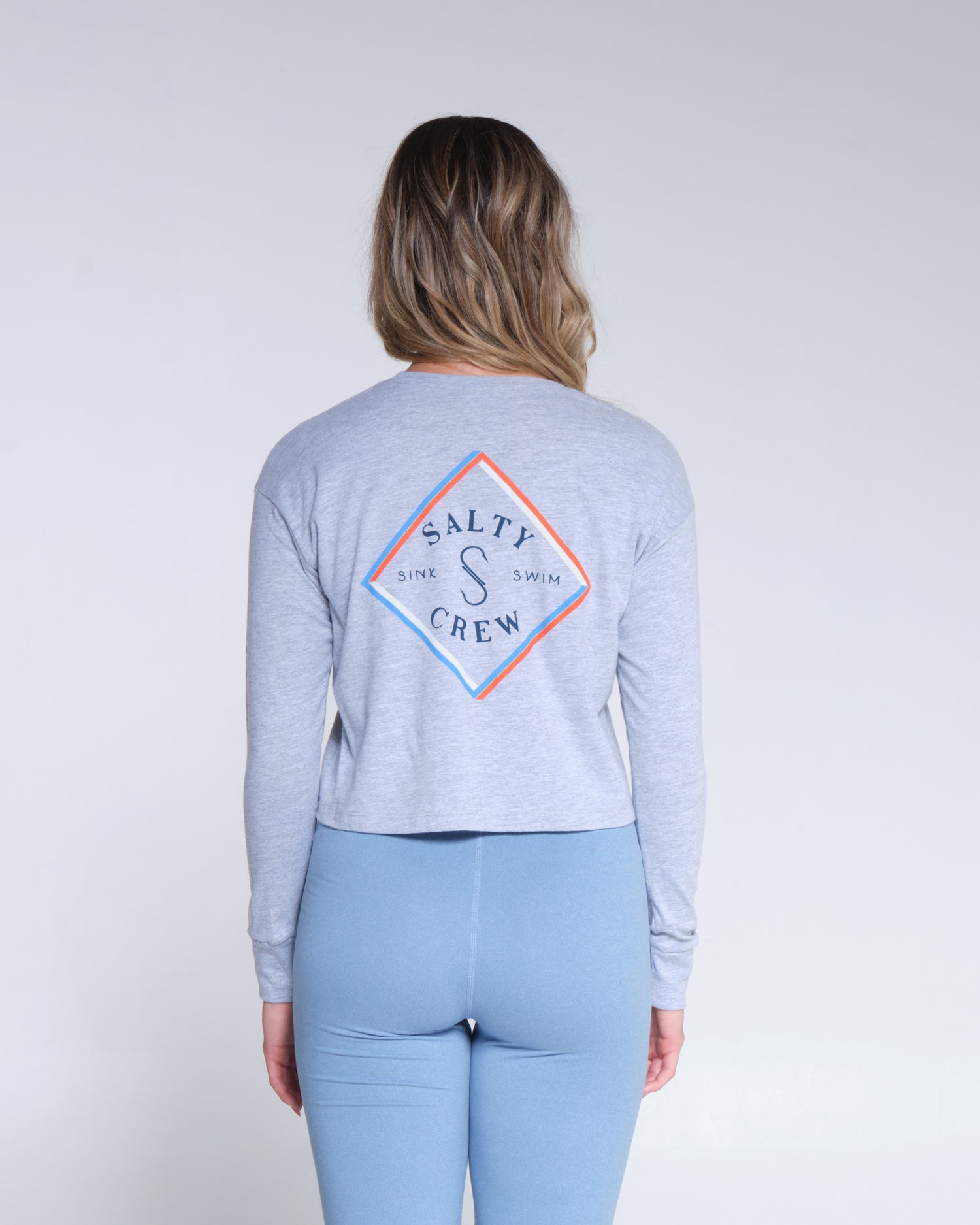 back graphic of Optical Tippet Athletic Heather L/S Crop Tee