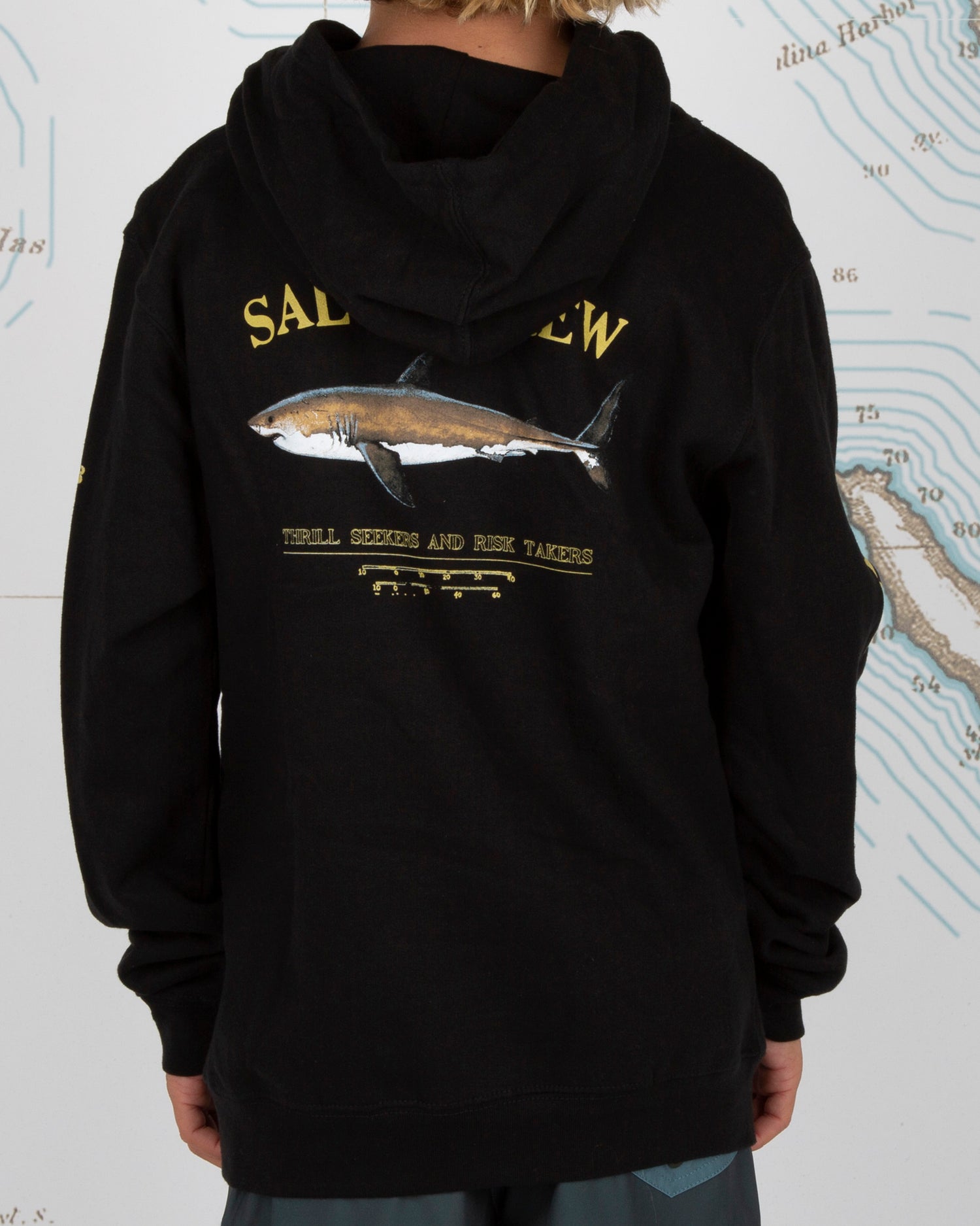 On body back of Bruce Boys Black Hood Fleece