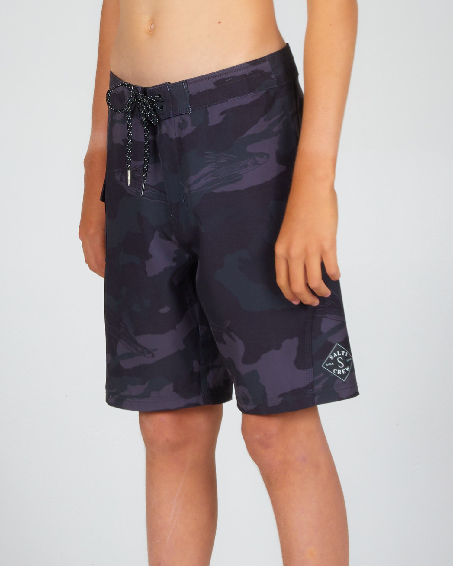 on body front angled view of the Lowtide Boys Black Camo Boardshort