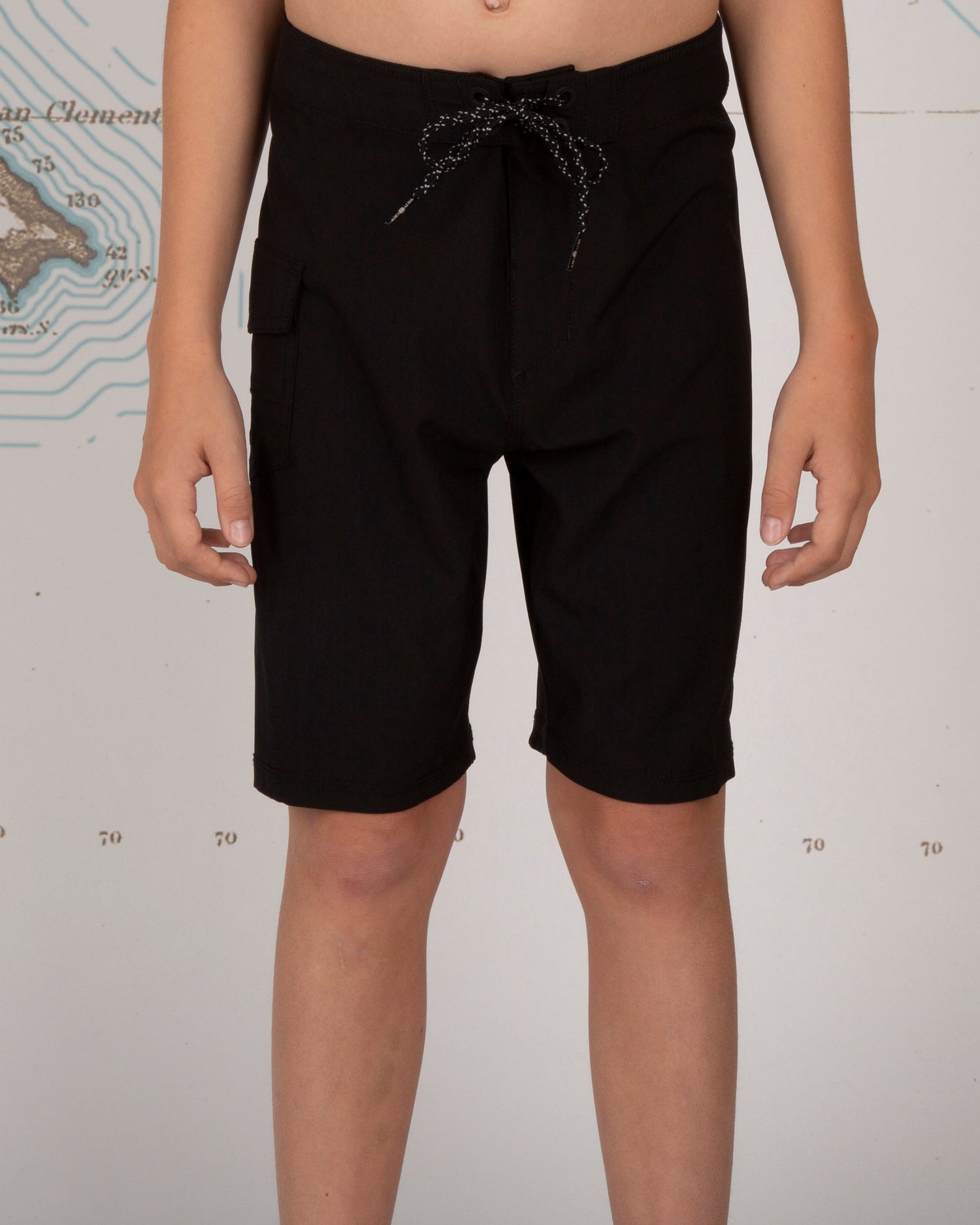 On  body front of Lowtide Boys Black Boardshorts