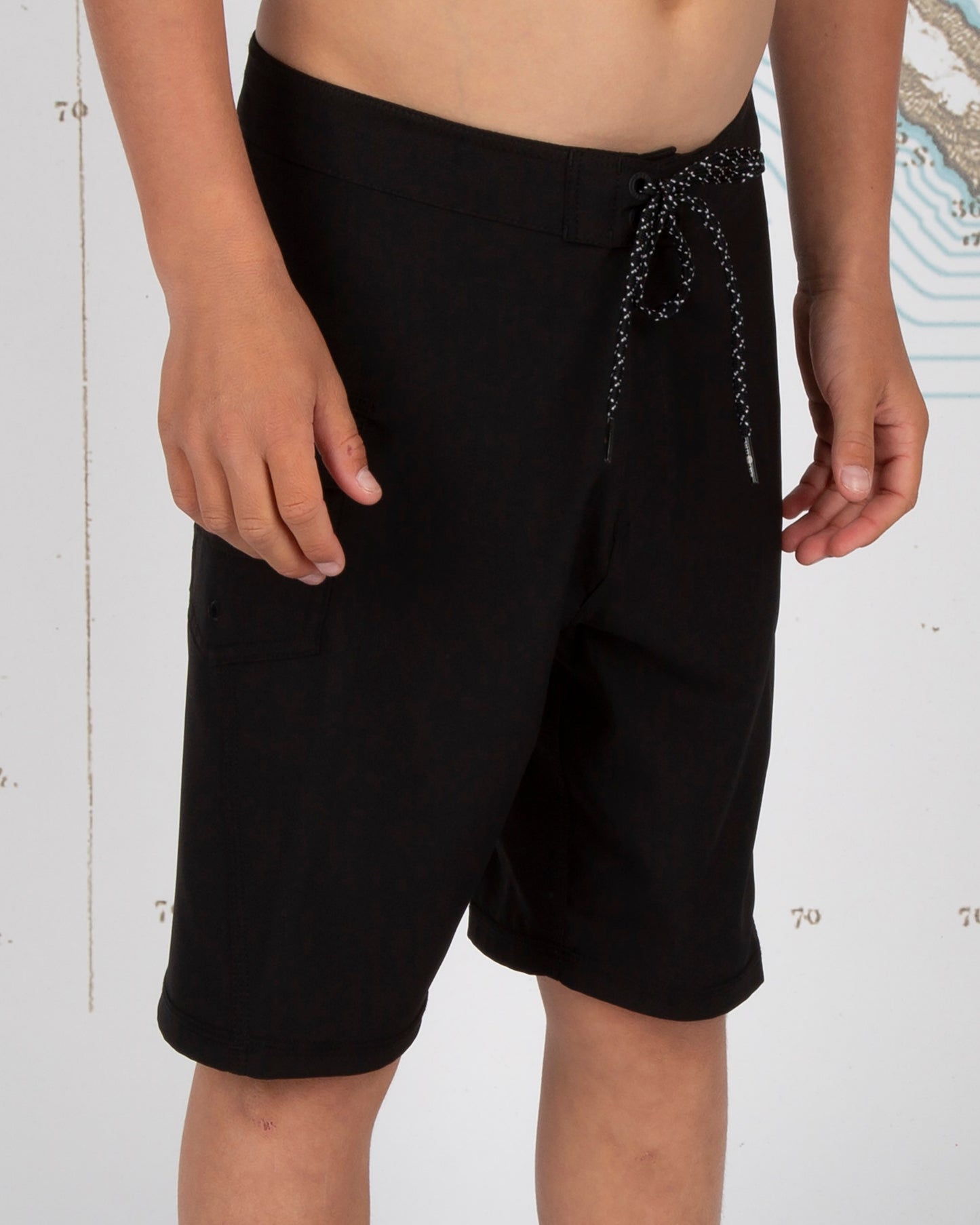 On body front angled of Lowtide Boys Black Boardshorts