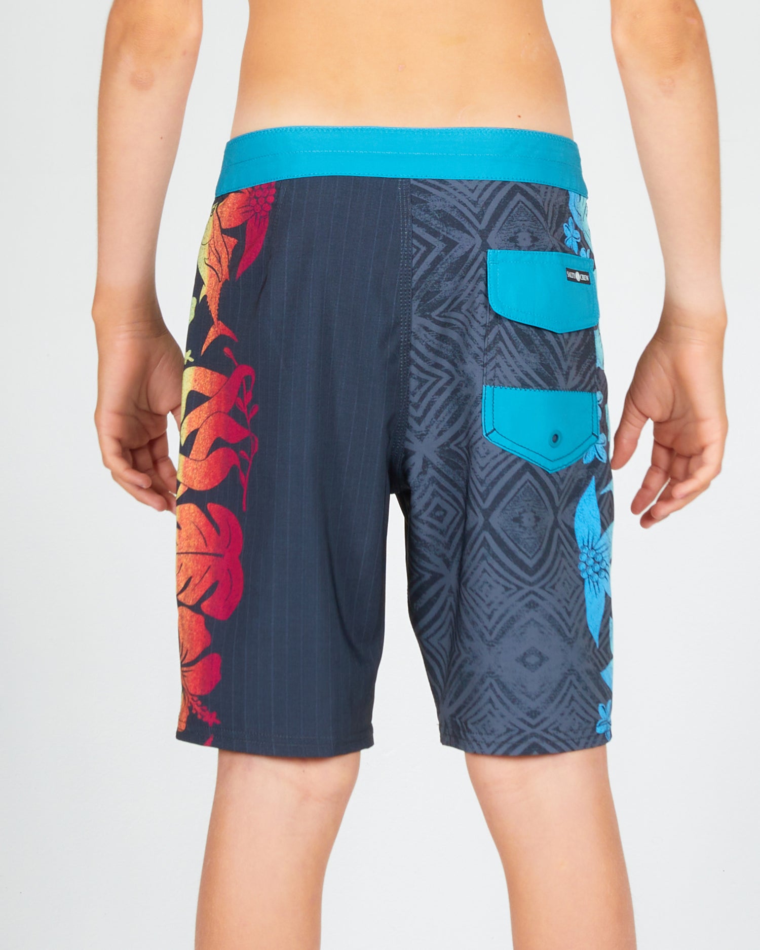 On body back of the Cedros Boys Black/Aqua Boardshort