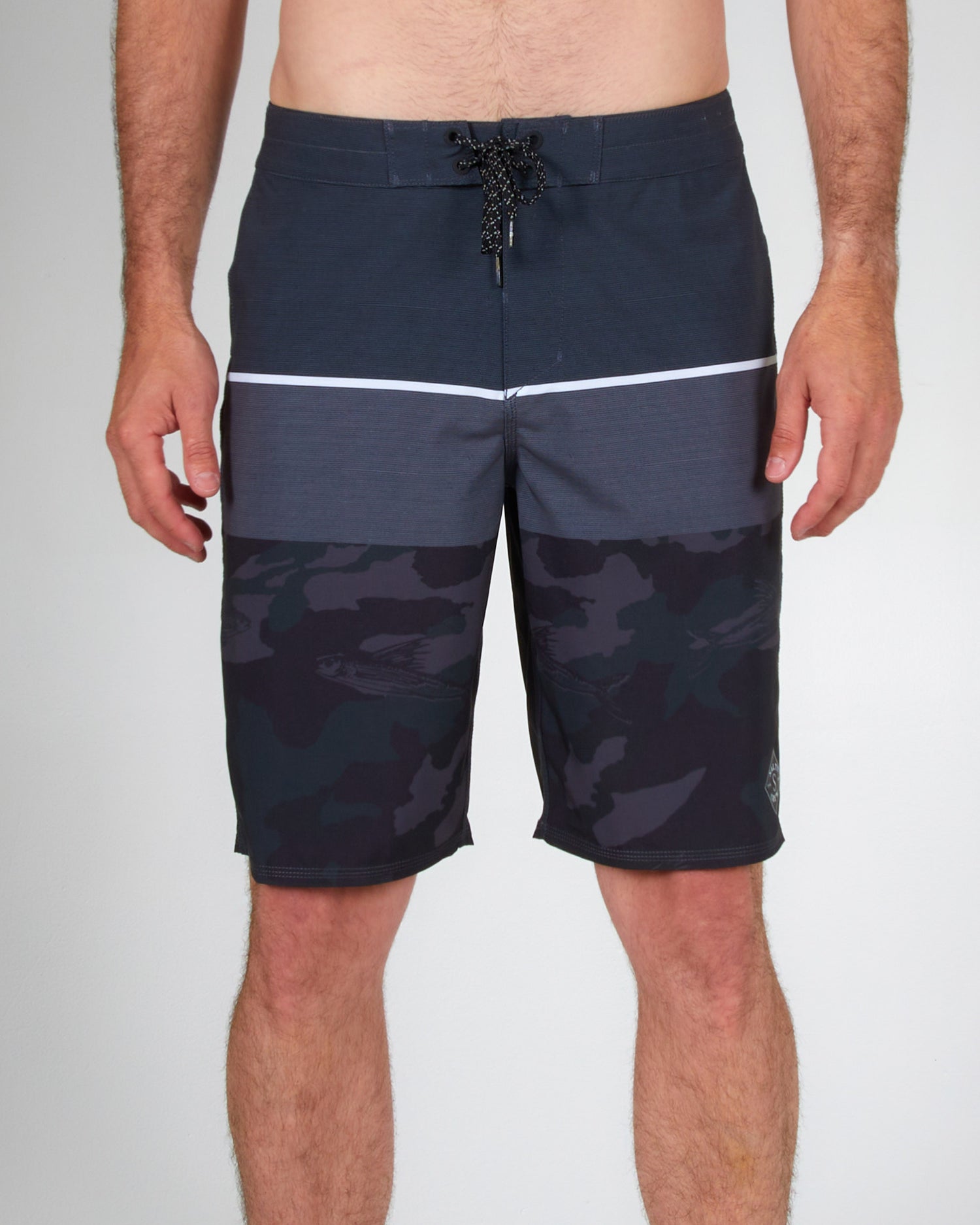 On body front of the Stacked Black Boardshort