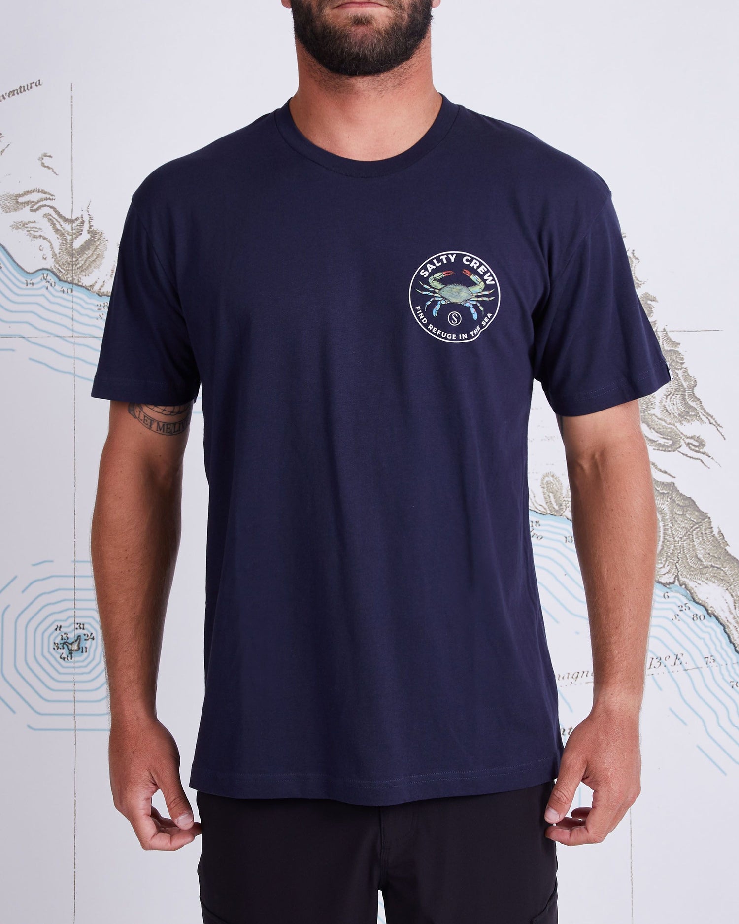 On body front of Blue Crabber Navy S/S Premium Tee